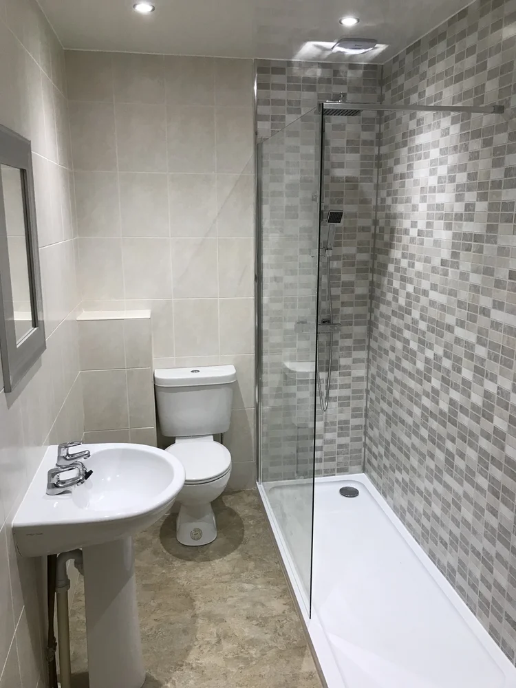 After renovation, bath-to-shower project 105