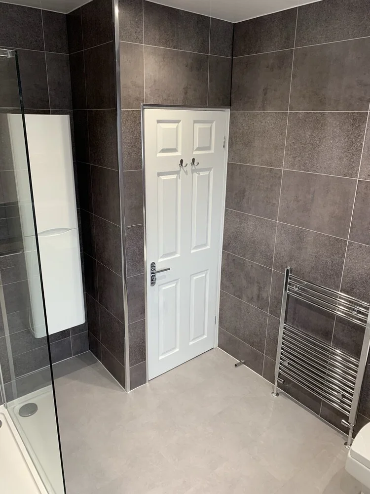 Wall-panelled bathroom installation, photograph 243