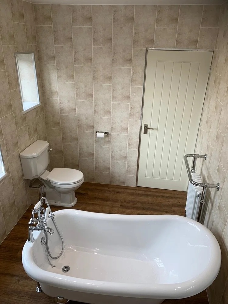 Wall-panelled bathroom installation, photograph 295