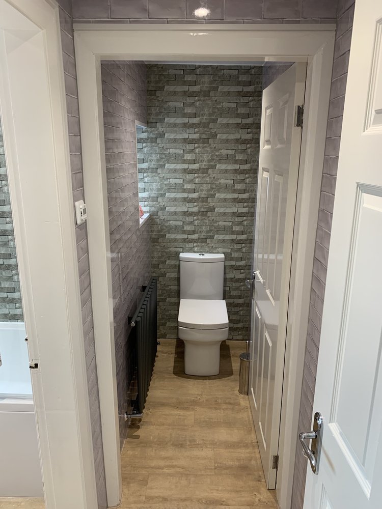 Wall-panelled bathroom installation, photograph 313