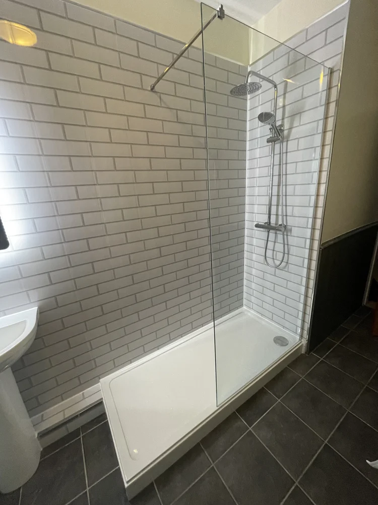 After renovation, bath-to-shower project 107