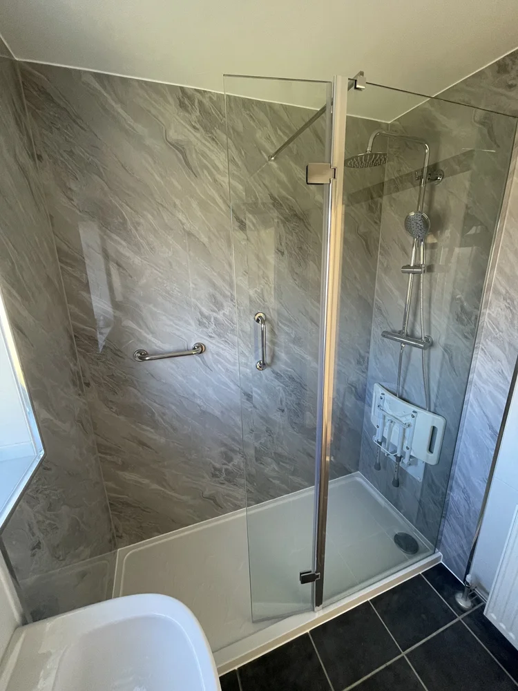 After renovation, bath-to-shower project 65