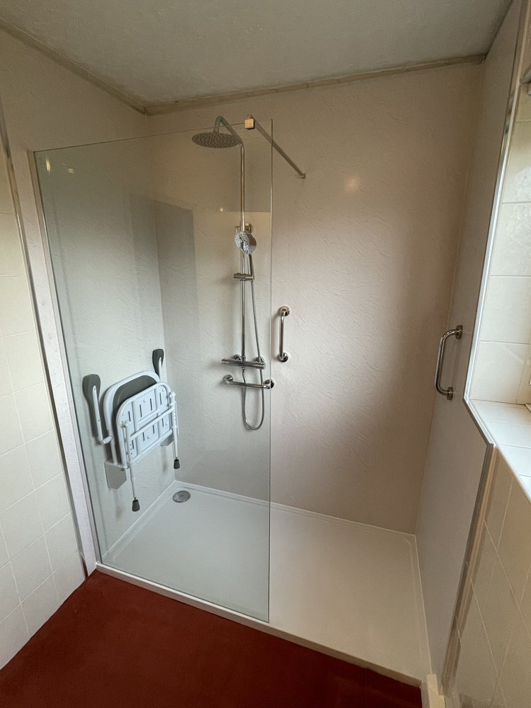 After renovation, bath-to-shower project 55
