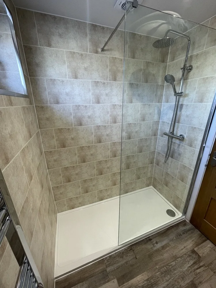After renovation, bath-to-shower project 63