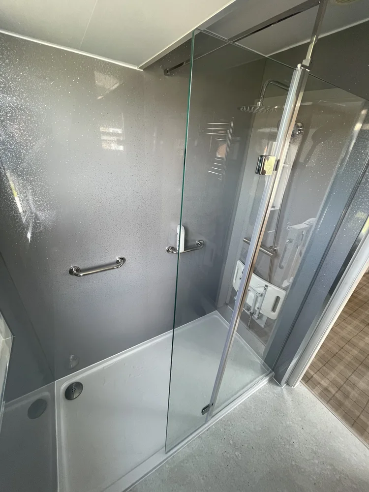 After renovation, bath-to-shower project 76