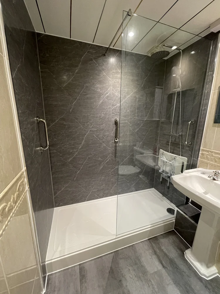 After renovation, bath-to-shower project 71