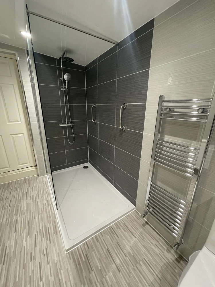 Wall-panelled bathroom installation, photograph 97