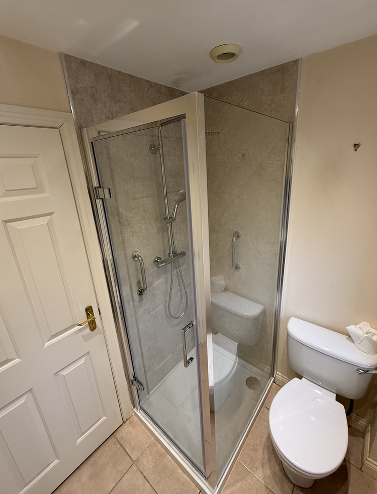 After renovation, bath-to-shower project 14
