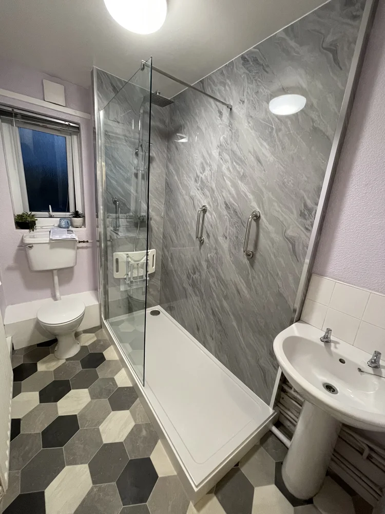 After renovation, bath-to-shower project 61