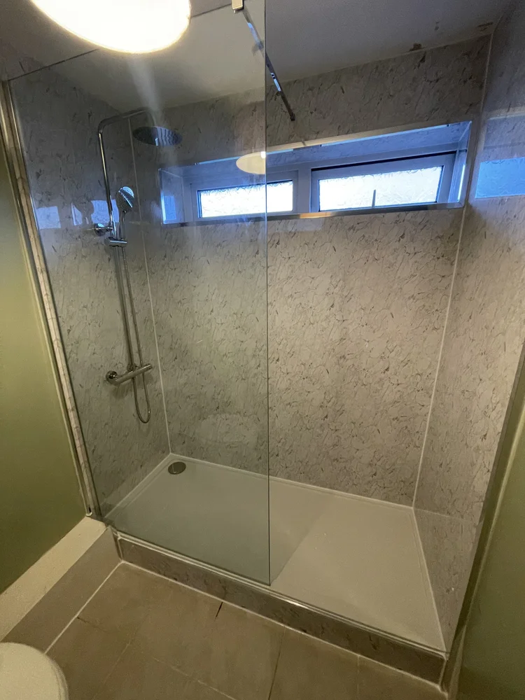 After renovation, bath-to-shower project 104