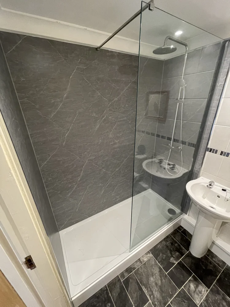 After renovation, bath-to-shower project 115