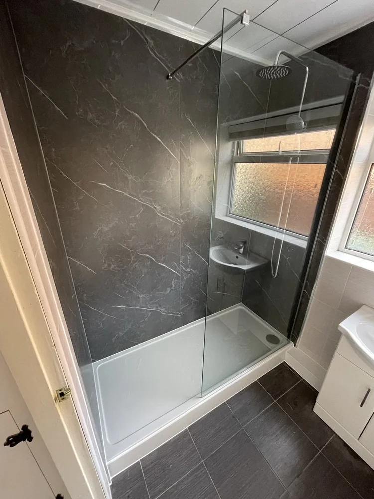 After renovation, bath-to-shower project 64