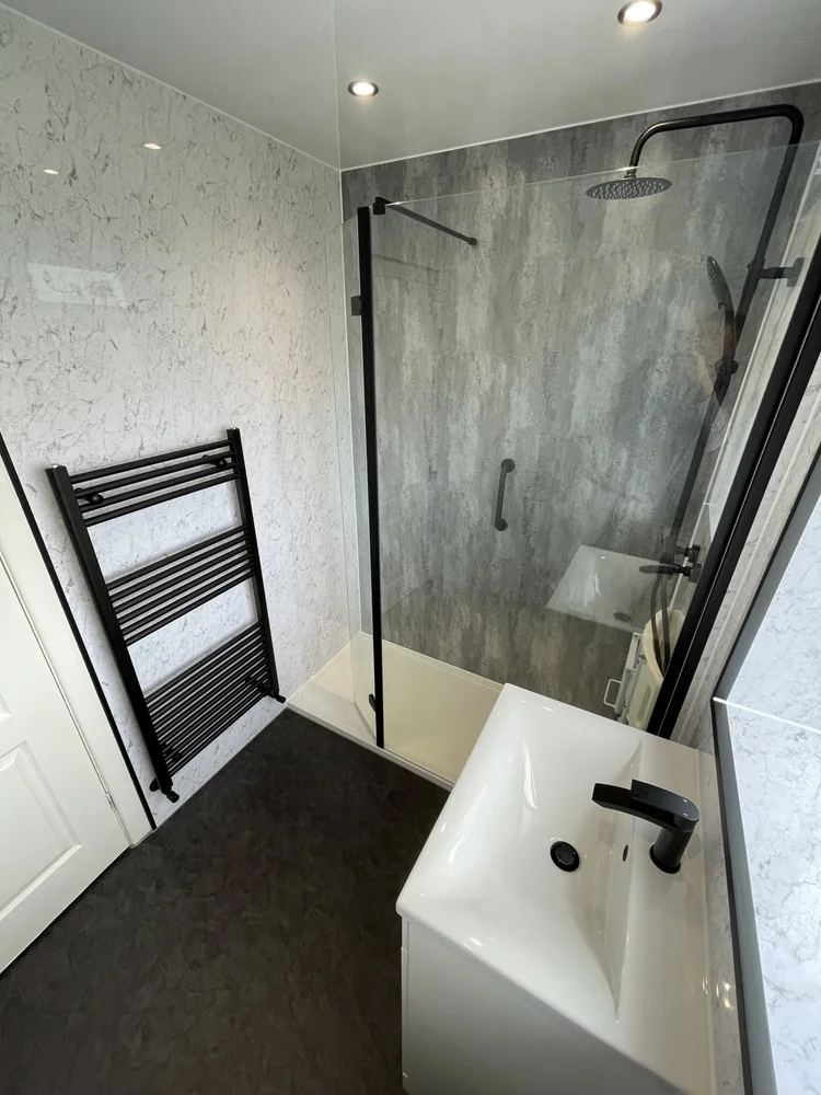 Wall-panelled bathroom installation, photograph 53