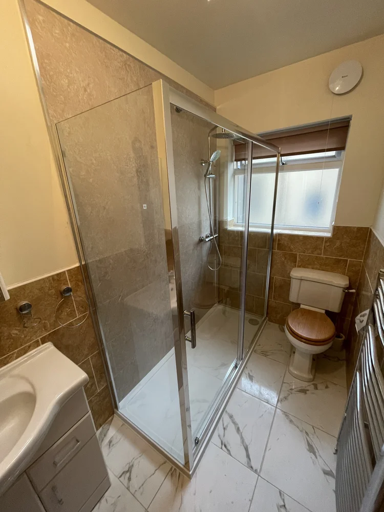 After renovation, bath-to-shower project 112
