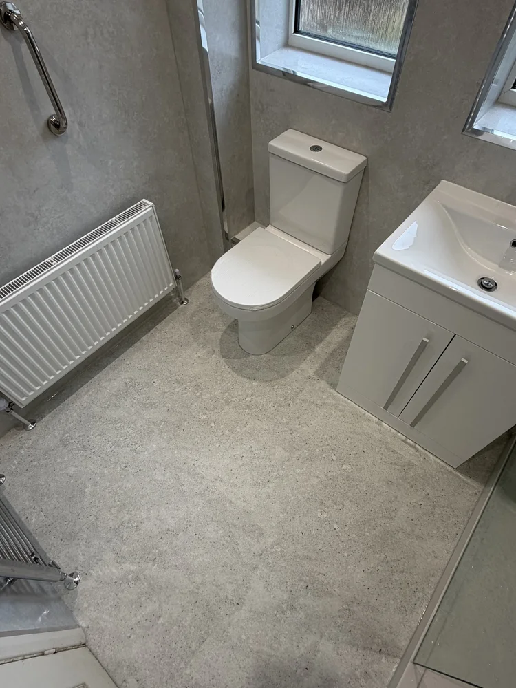Wall-panelled bathroom installation, photograph 56
