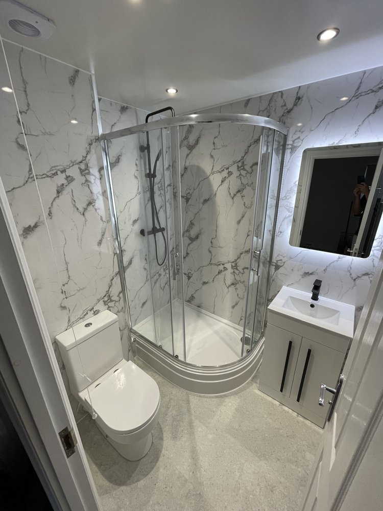 Wall-panelled bathroom installation, photograph 105