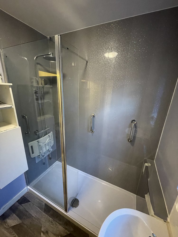 After renovation, bath-to-shower project 102