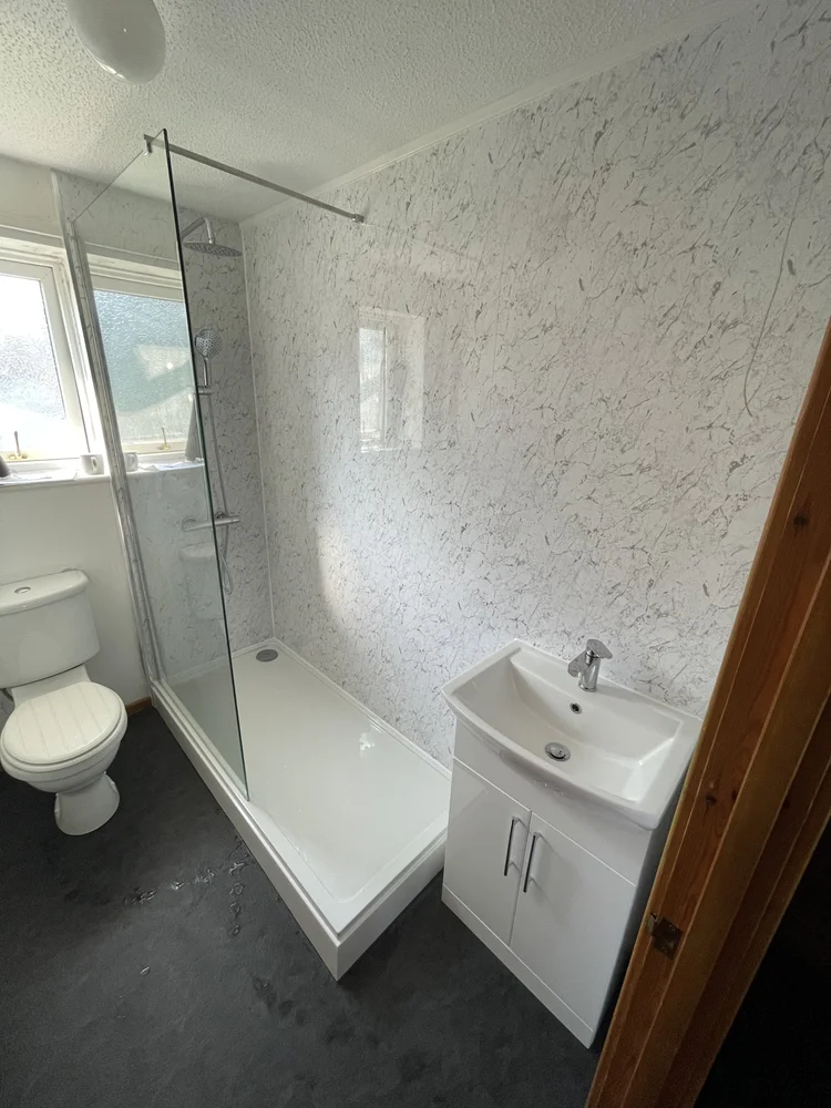 After renovation, bath-to-shower project 117