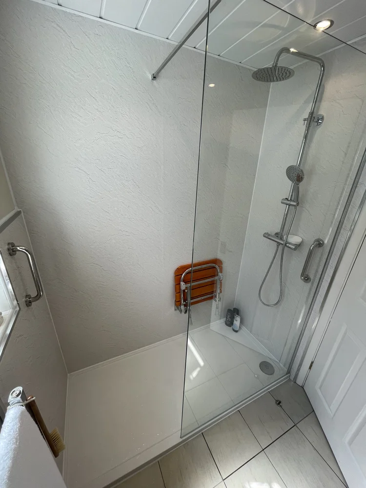 After renovation, bath-to-shower project 124