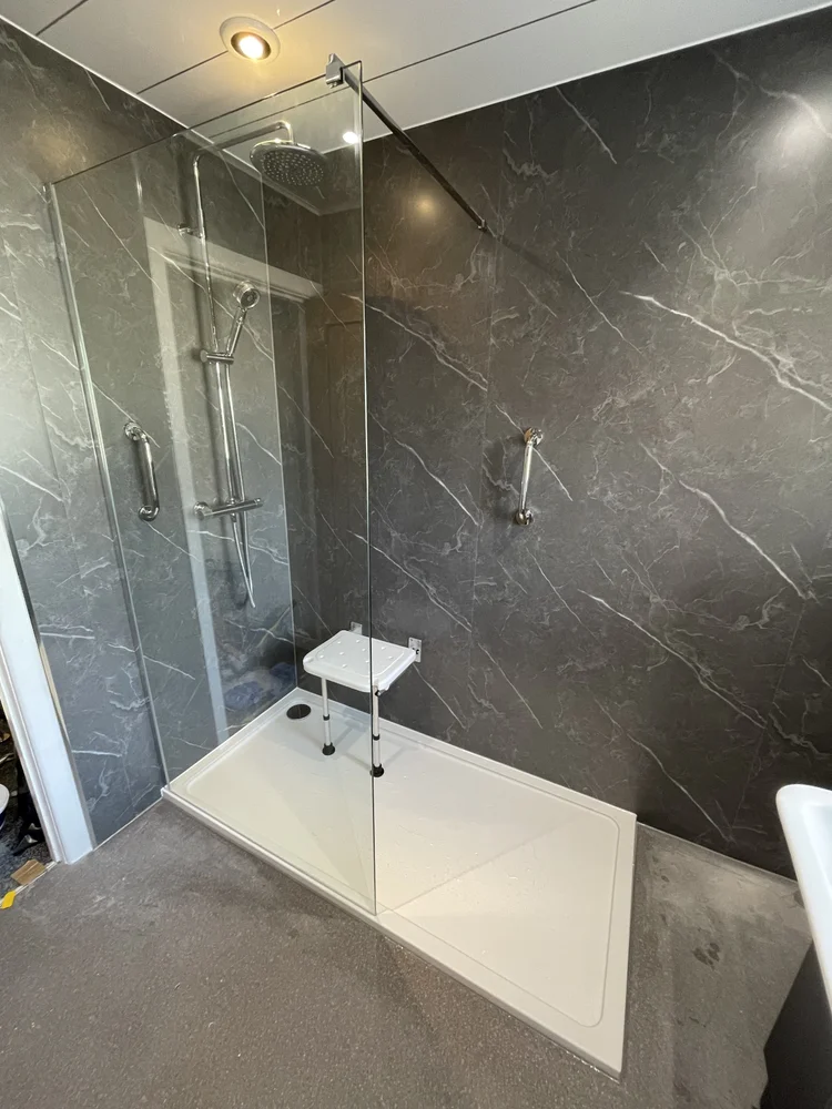 After renovation, bath-to-shower project 52
