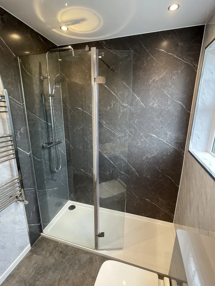 After renovation, bath-to-shower project 32