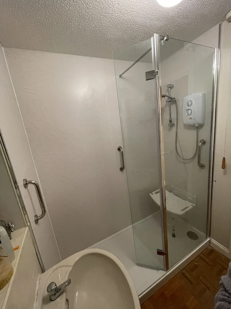 After renovation, bath-to-shower project 106
