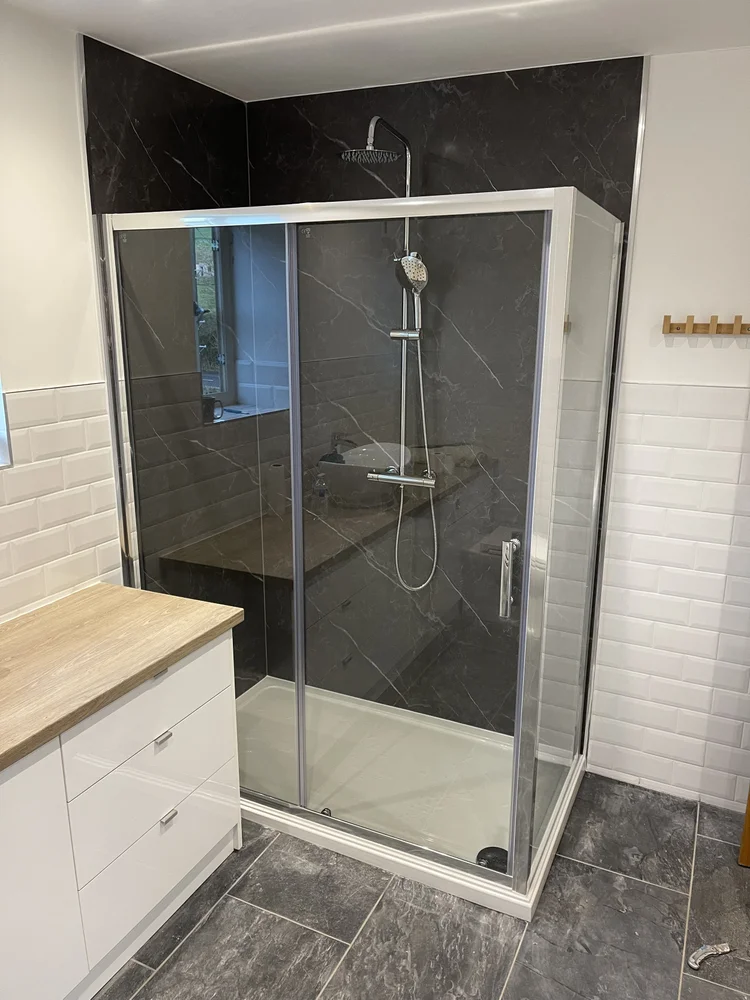After renovation, bath-to-shower project 62