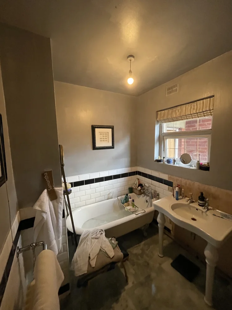Before renovation, bath-to-shower project 23