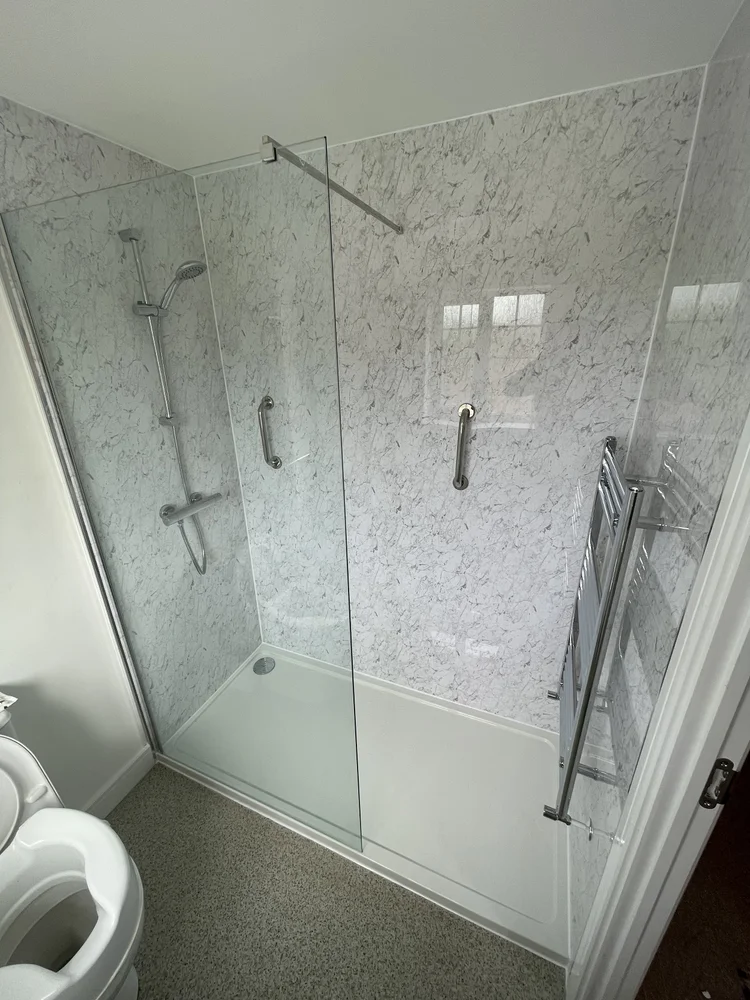 After renovation, bath-to-shower project 74