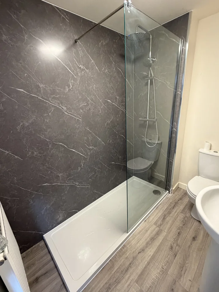 After renovation, bath-to-shower project 24