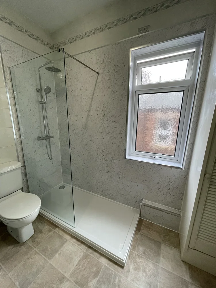 After renovation, bath-to-shower project 58
