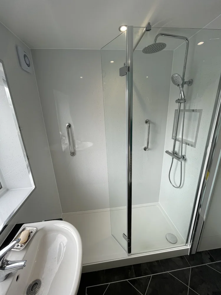 After renovation, bath-to-shower project 80