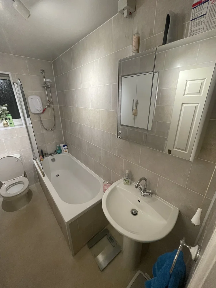 Before renovation, bath-to-shower Durham project
