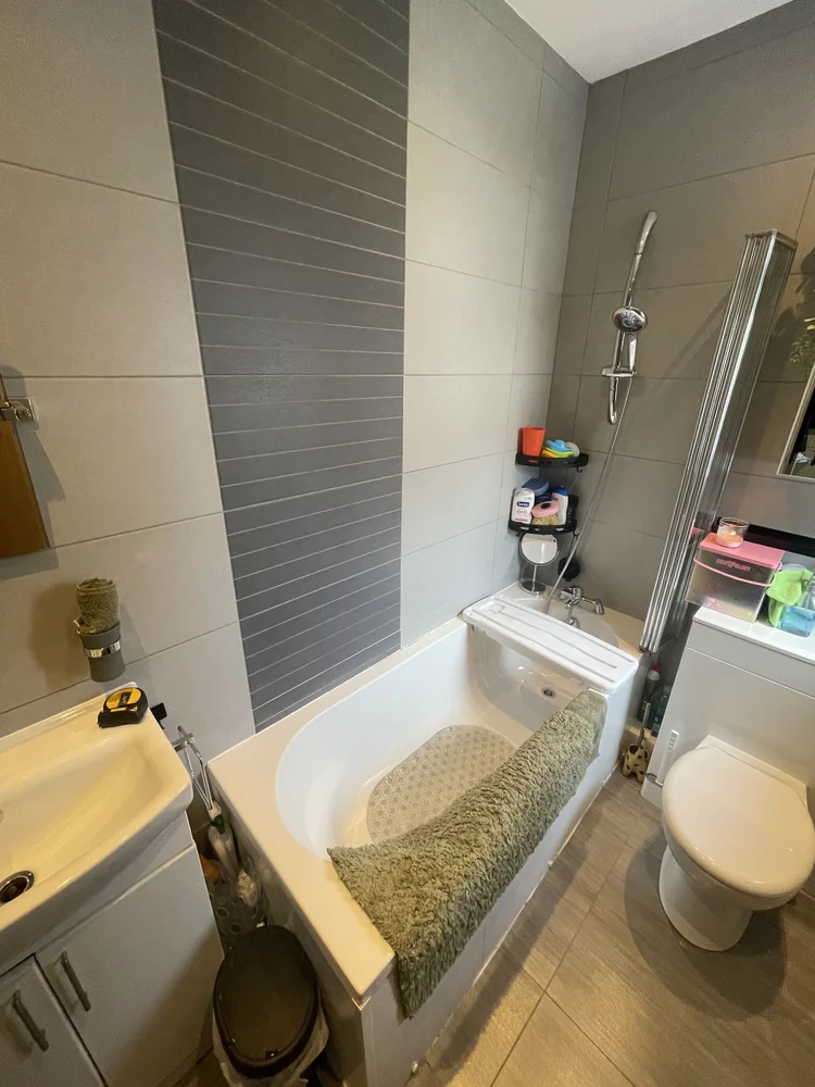 Before renovation, bath-to-shower Hartlepool project