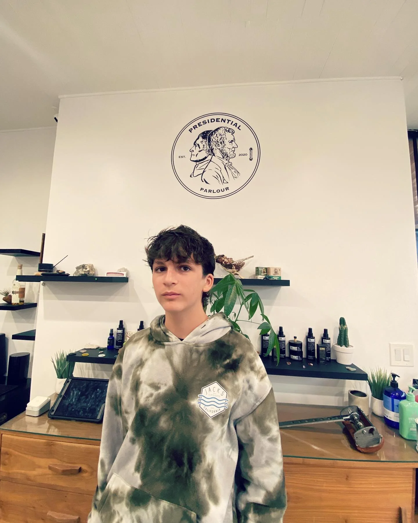 Just a trim...can you tell how much he loves haircut day? I love a fancy barber shop that has cold beer while you wait and amazing barbers Thanks Noelle @thepresidentialparlour always slays the 'do #wolfcutcurlyhair @roman_coltrane