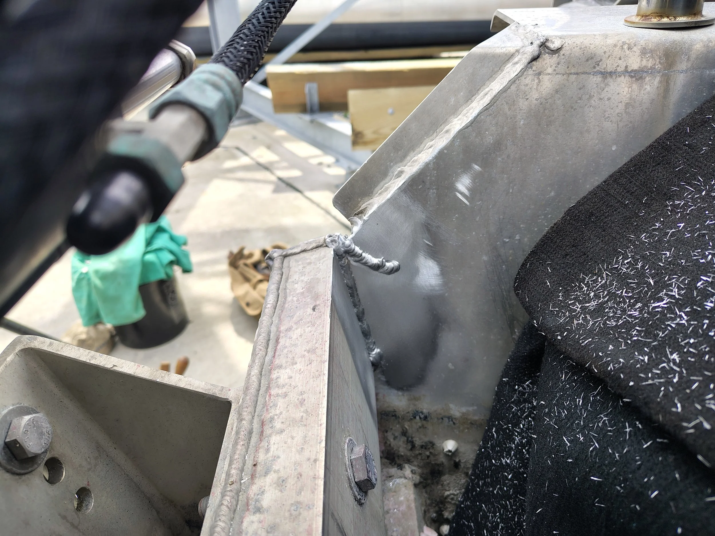 Completed 5356 TIG weld bead over repaired crack on opposite face of aluminum boat transom in Rehoboth Beach Delaware