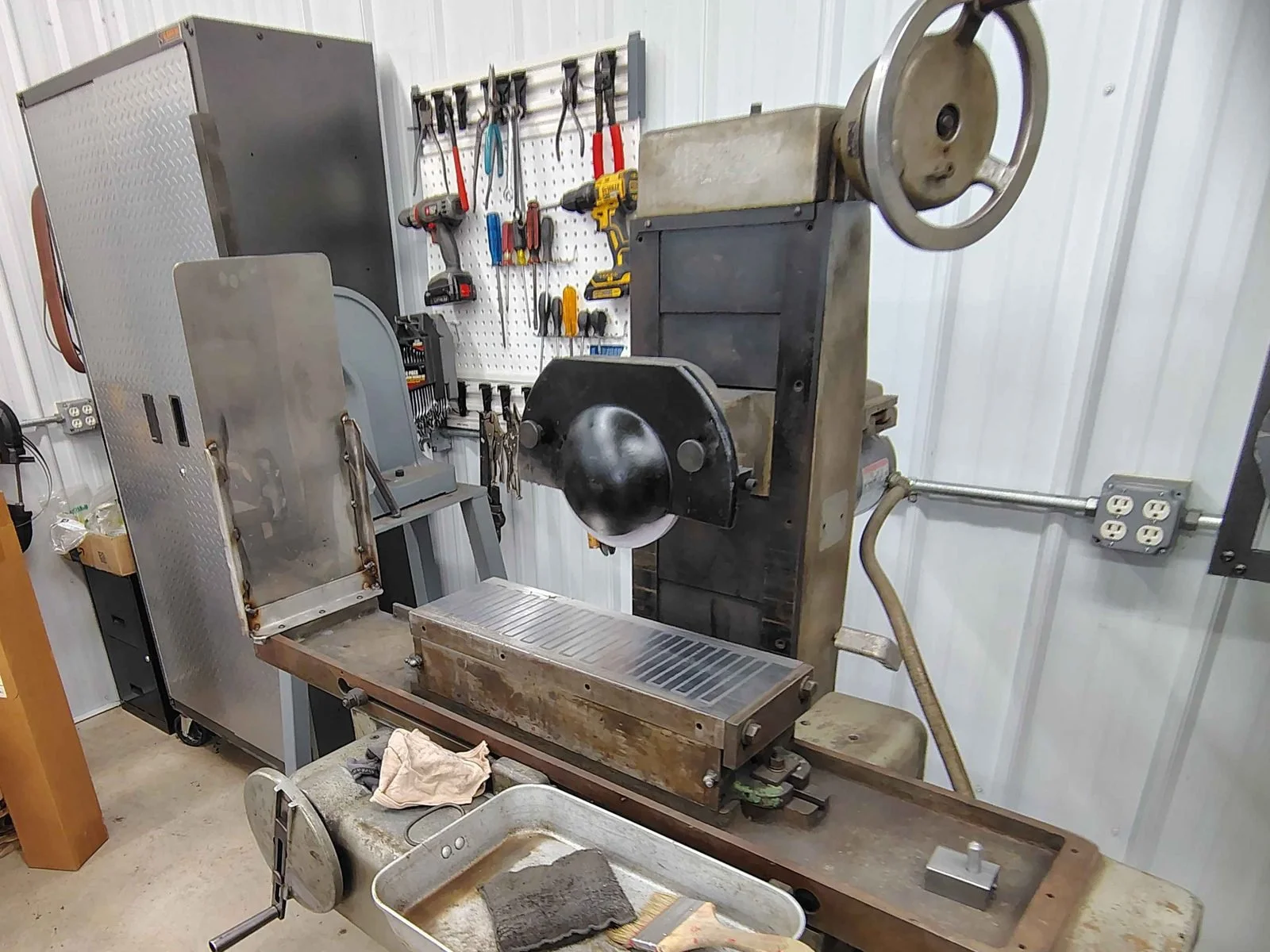 Surface grinder with magnetic chuck for precision flat grinding at PIE Weld & Machine manual machine shop in Cecil County, MD