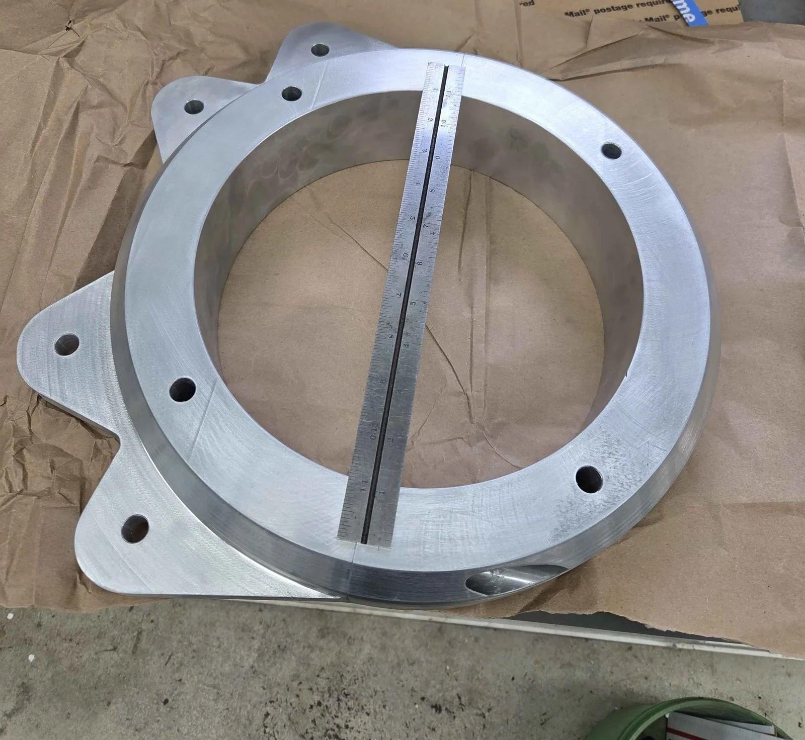 Completed machined aluminum split ring refueling probe mount for a CH-47 Chinook helicopter made at PIE Weld & Machine in Cecil County, MD