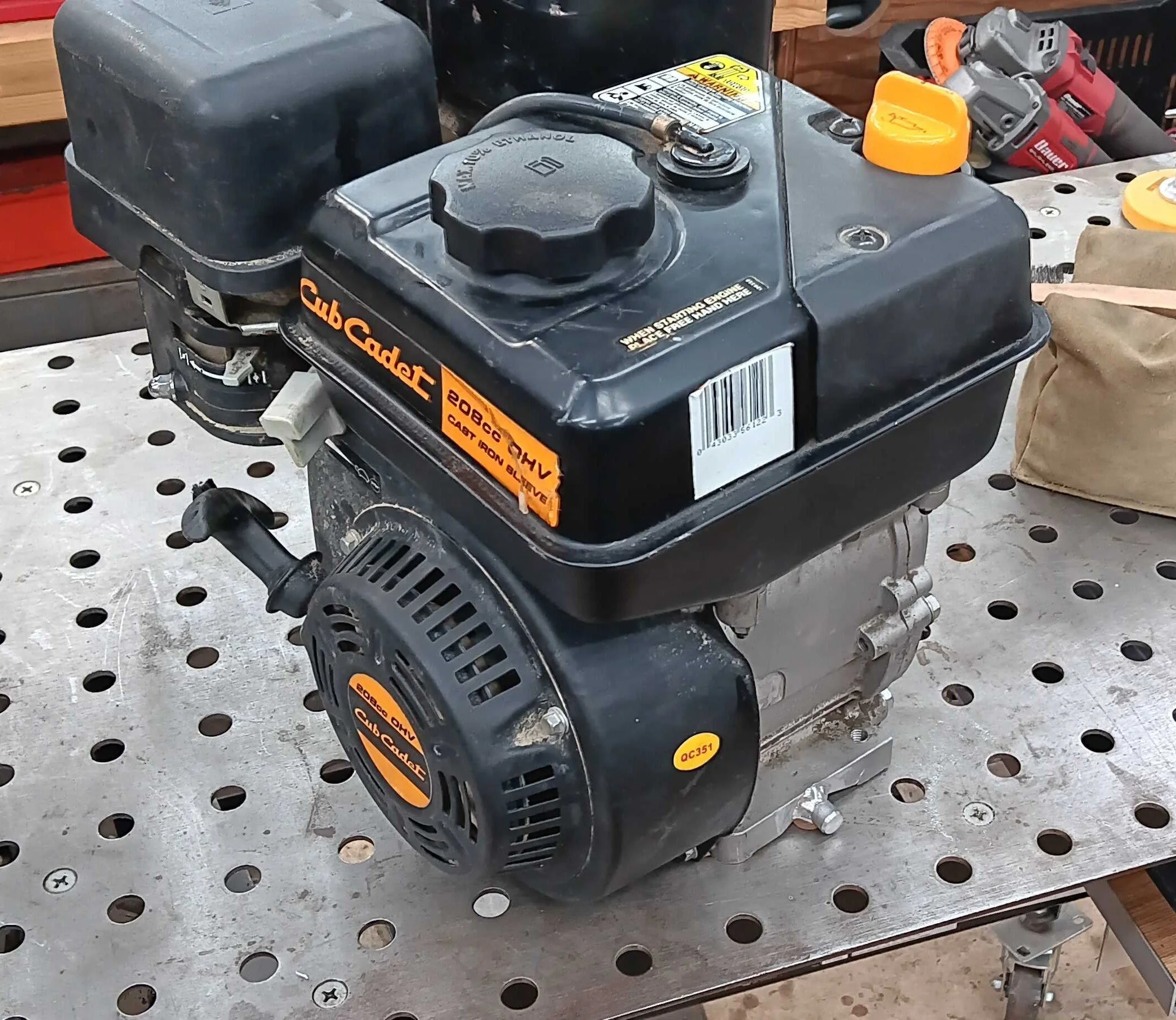 Finished Cub Cadet 208cc OHV engine after cast aluminum oil drain port repair, back on the shop table ready for service — cast aluminum engine repair, PIE LLC Weld & Machine, Cecil County MD serving Maryland and Delaware