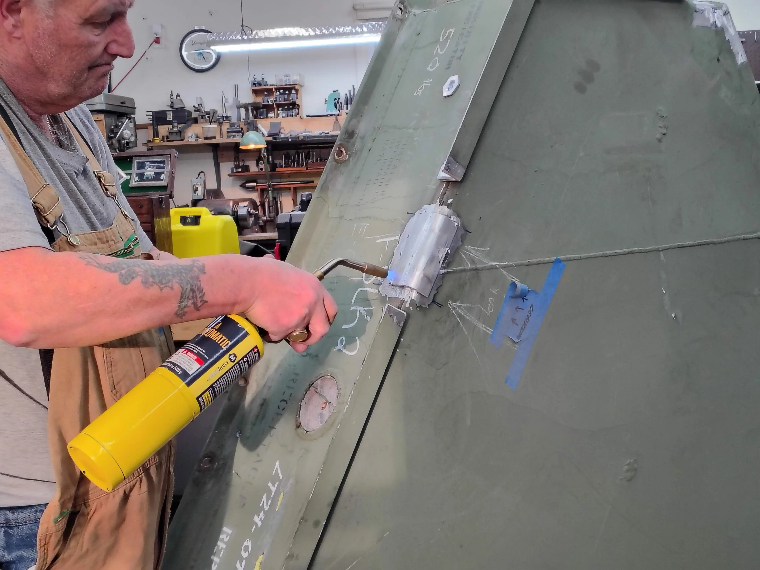 Aluminum preheat repair on Boeing CH47 Chinook helicopter gas turbine engine part container using MAPP torch. 6061 base material, 4047 filler wire. PIE LLC Weld and Machine, Warwick MD.