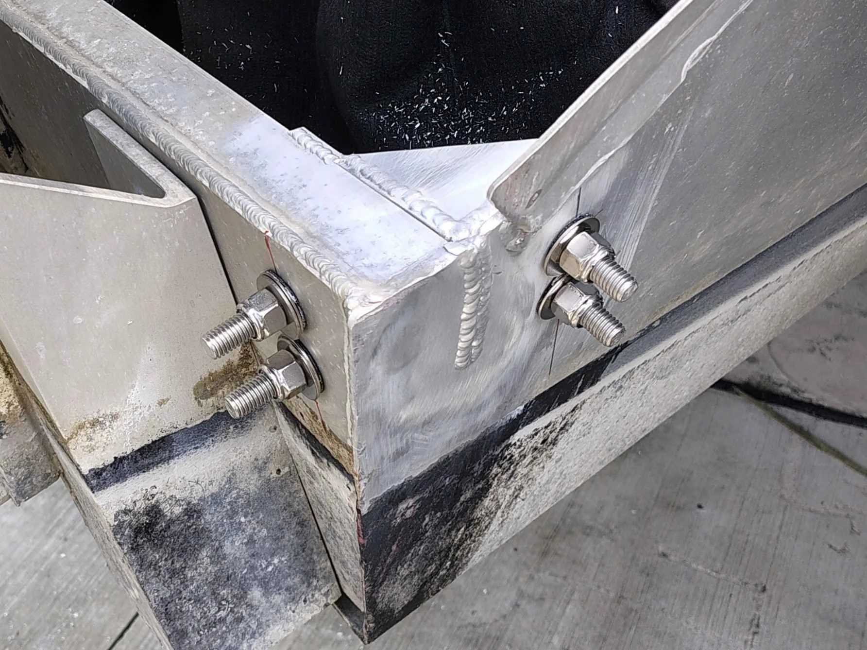 Installed aluminum reinforcement plate bolted with stainless hardware and welded vertically on boat transom in Delaware