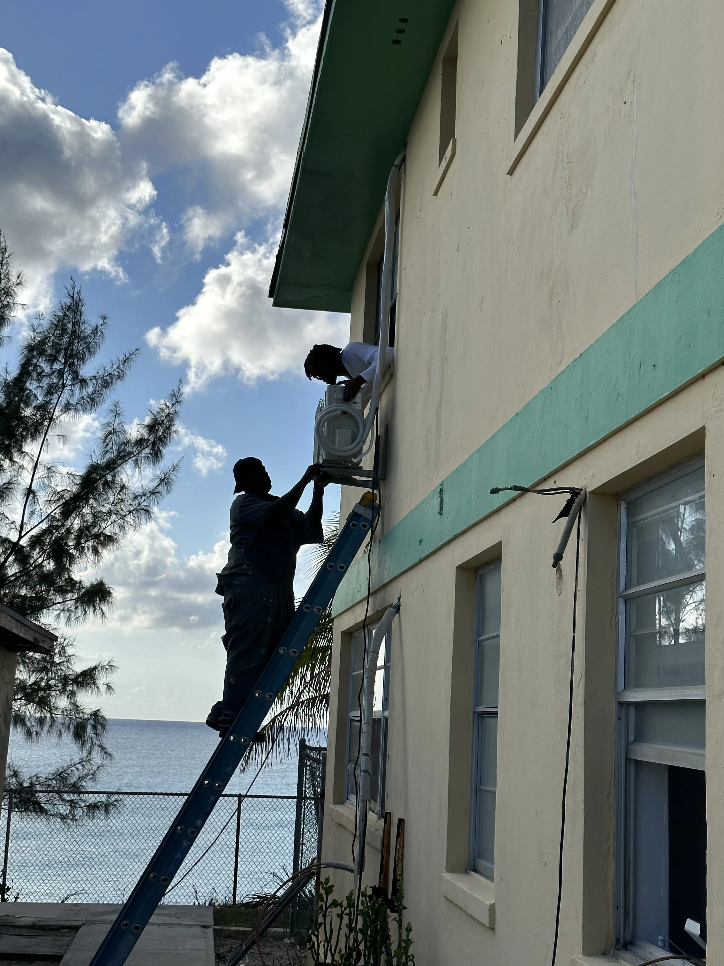 Local expert LT assisting in new AC units