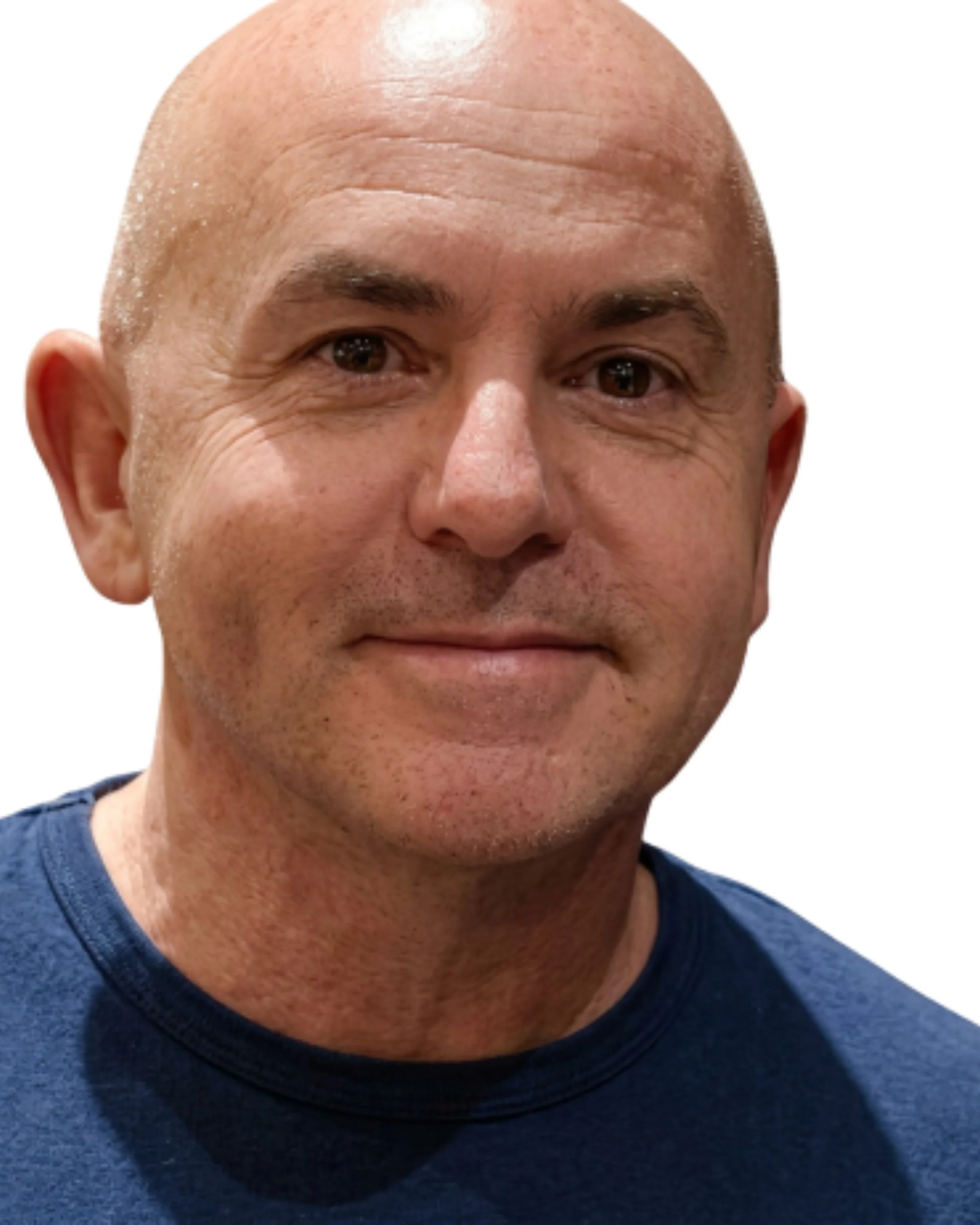 An image of a casually dressed man smiling