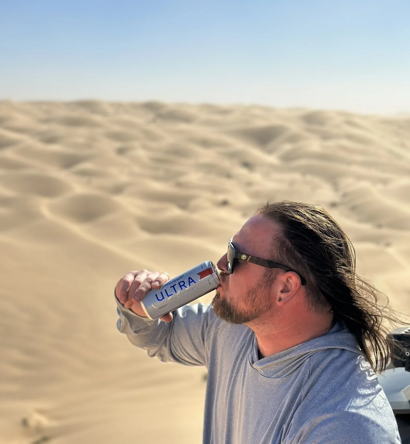 JROWE CHUGGING BEER.JPEG