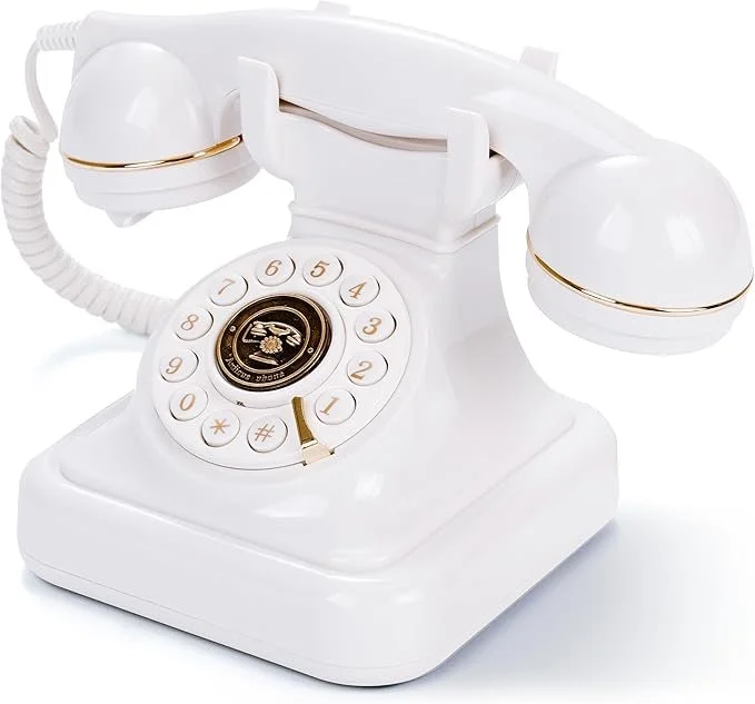 A vintage white rotary telephone with gold accents and a circular dial, featuring a handset connected by a coiled cord.