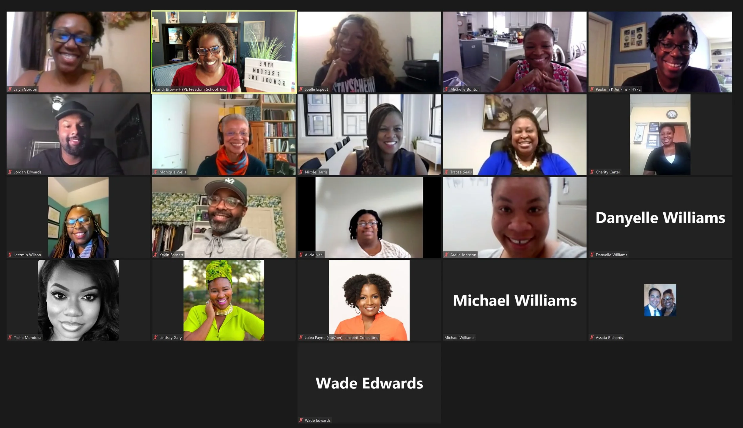 Picture of Black leaders smiling in a Zoom meeting.