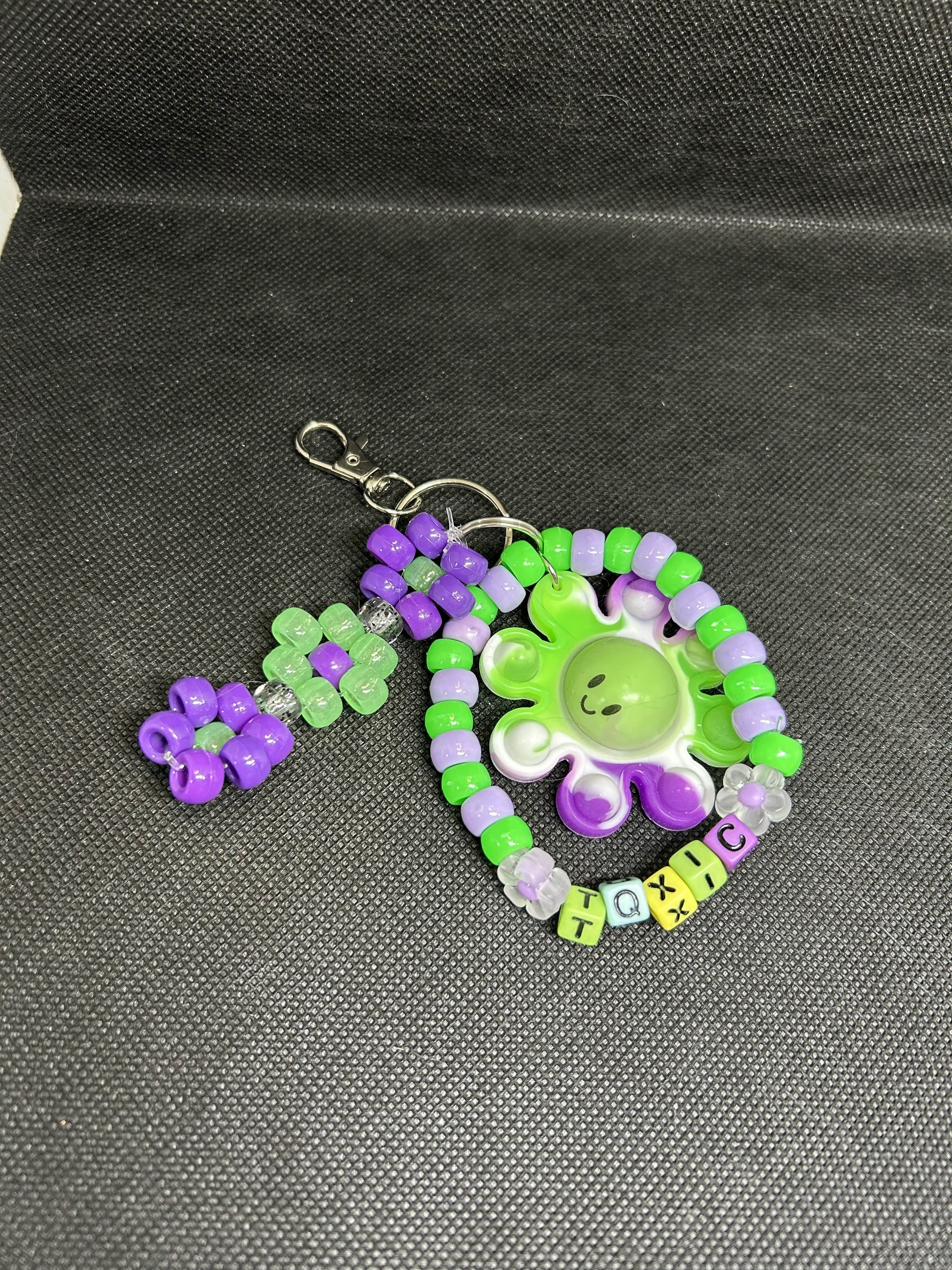 “TOXIC” Octopus Keychain | Green & White Beaded Accessory with Flower Charms for Bags & Gifts