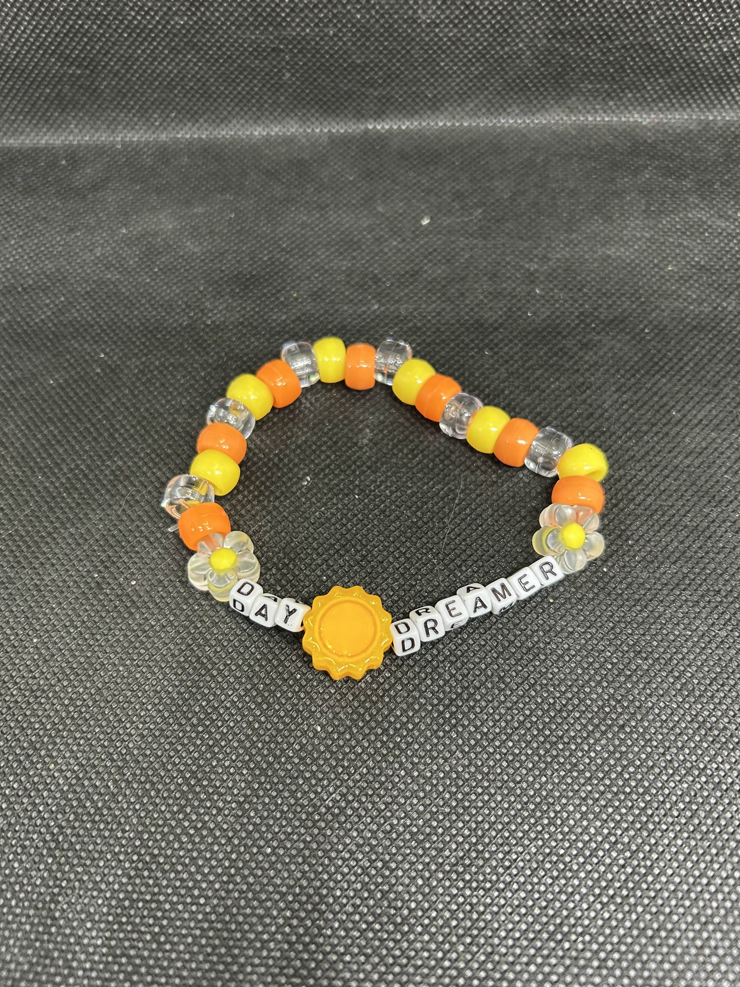 “DAYDREAMER” Kandi Bracelet | Yellow Sun Charm Rave Single with Orange Flower Beads & Warm Tones