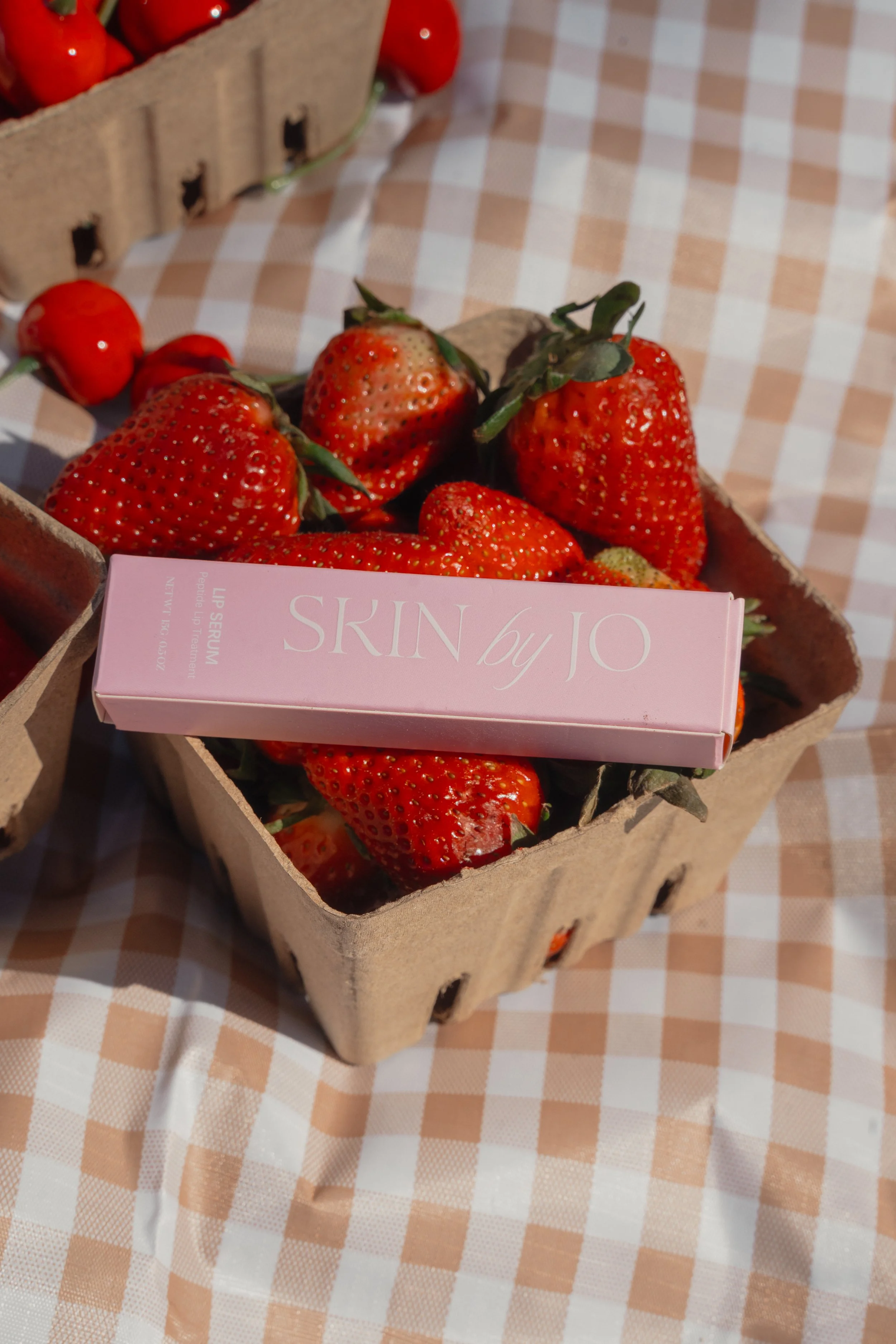 Strawberry Scoop Lip Peptide Gloss