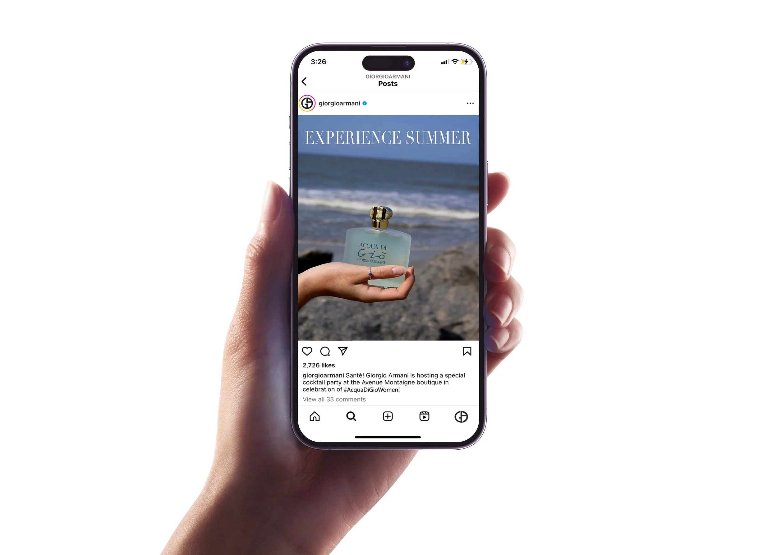 Smartphone displaying an Instagram post with an image of a hand holding a perfume bottle against the ocean background and text "Experience Summer".